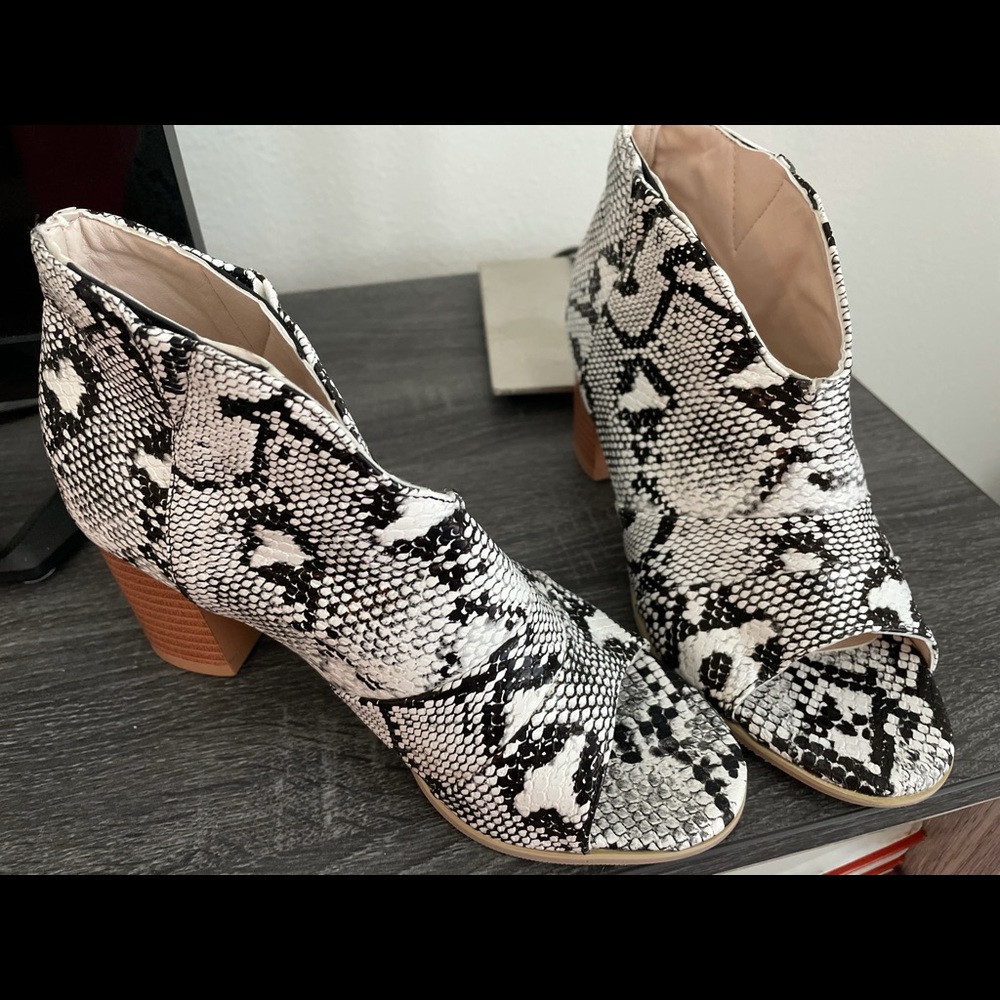 Brand new ankle booties animal print